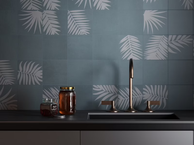 Azulejos tropicales pared cocina verde con varios diseños de hojas de palmera