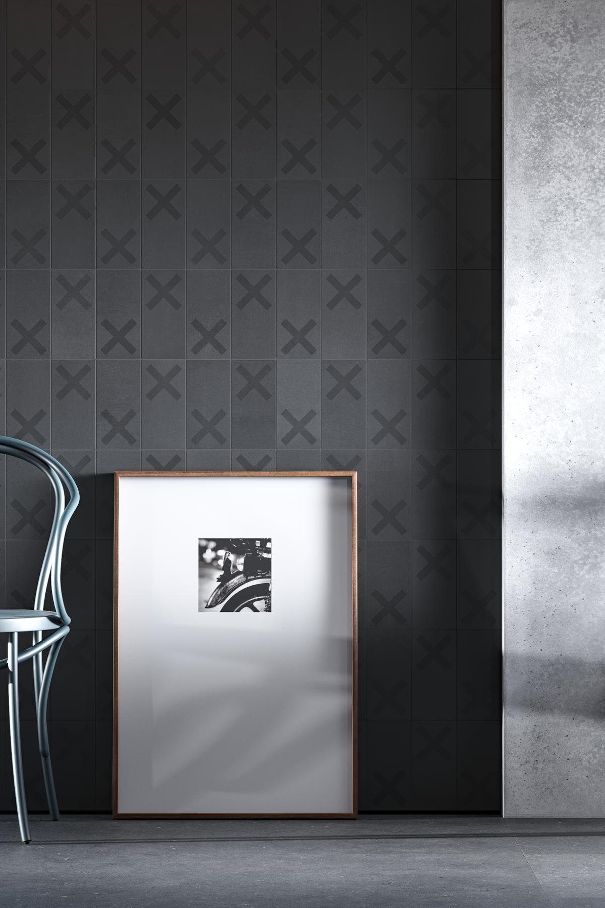 Revestimiento interior de cemento con un diseño geométrico en color antracita