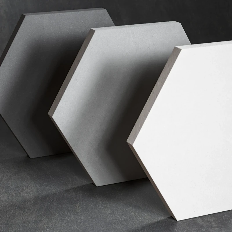 Azulejos hexagonales en tres bases de cemento