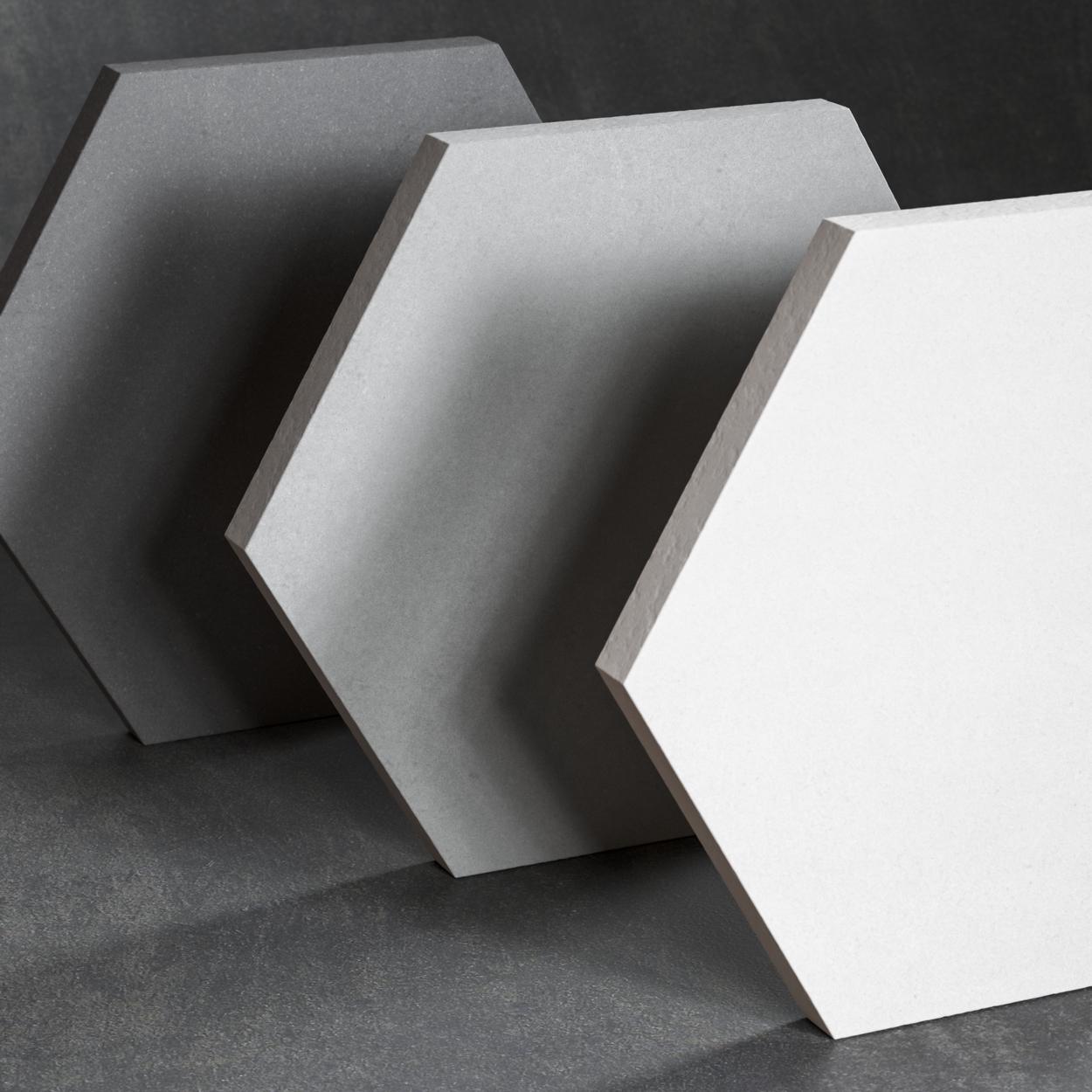 Azulejos hexagonales en tres bases de cemento