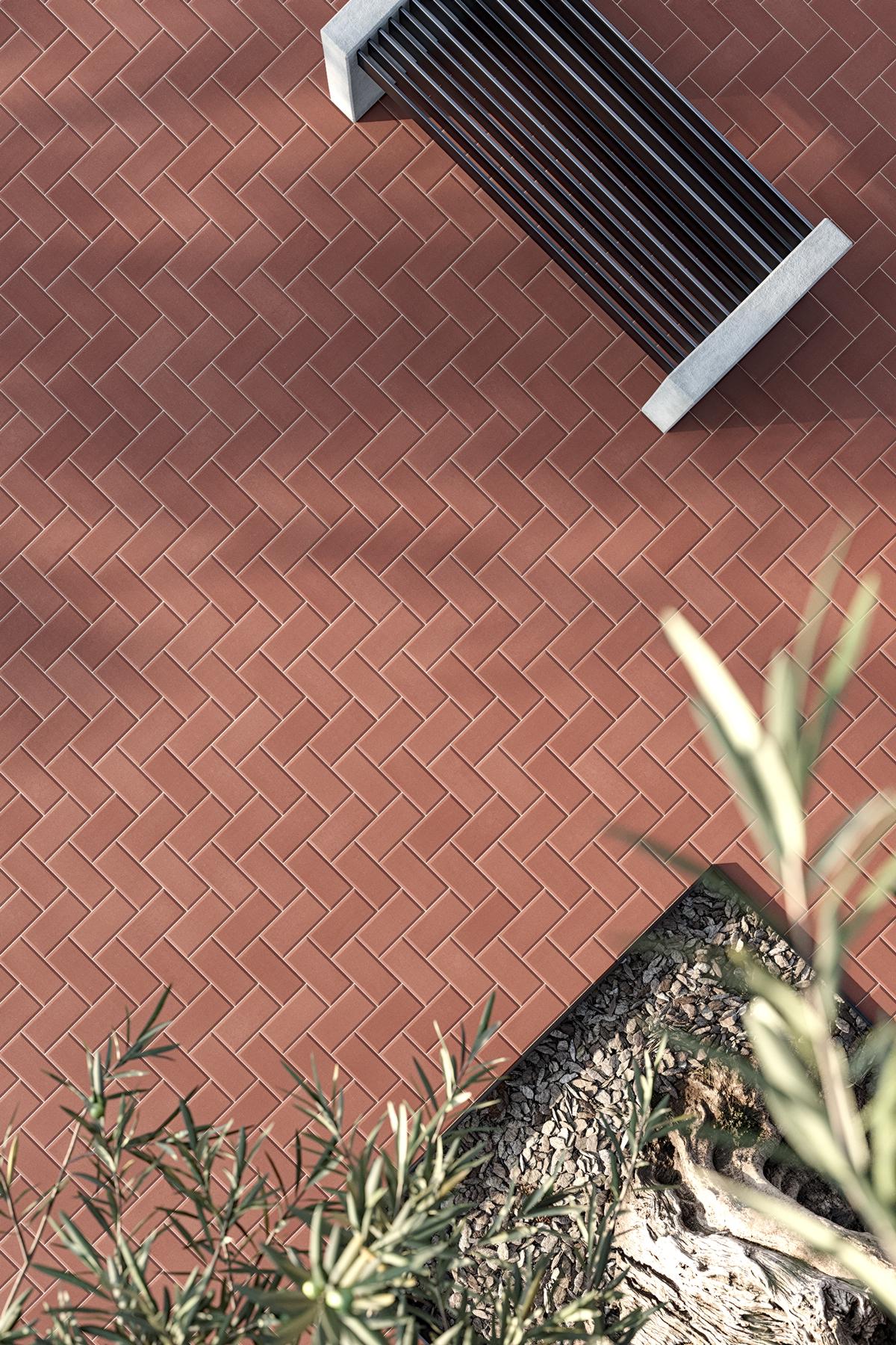 Adoquines de hormigón de la colección Paviblock en color terracota y de aplicación en suelo de jardín