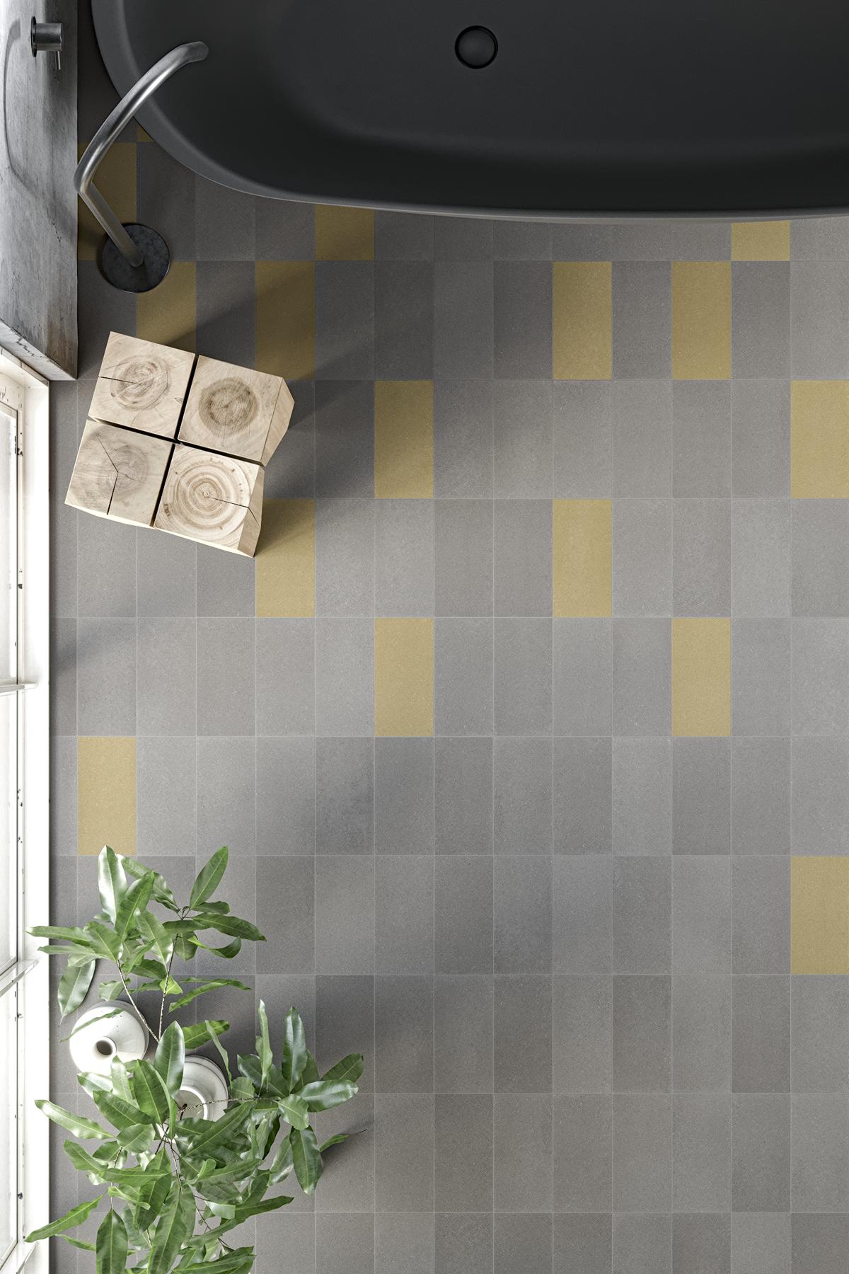 Suelo de interior combinado con baldosas de cemento Paviblock en tonos gris y amarillo