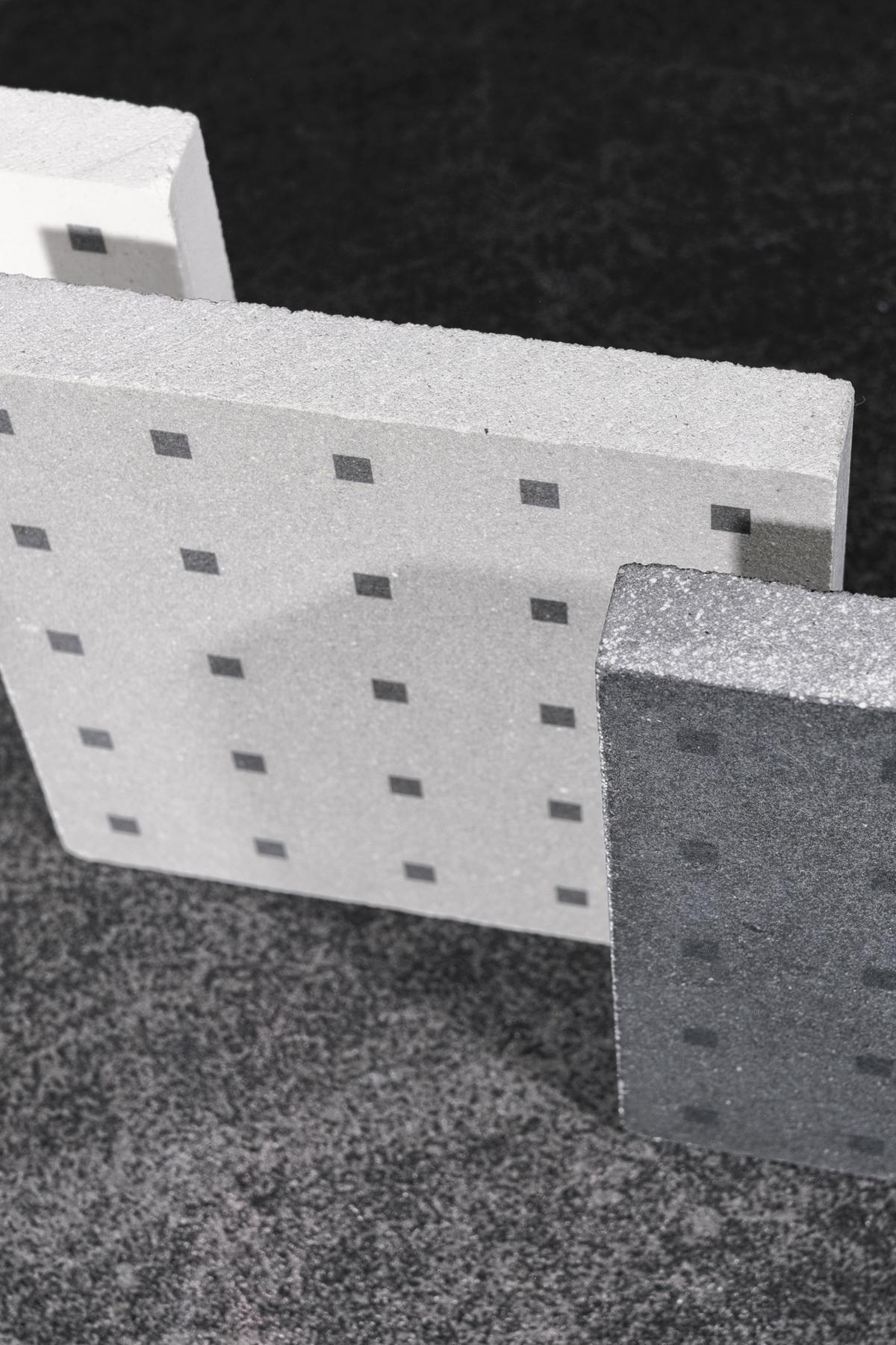 Revestimiento de pared y suelo en cemento blanco, gris y negro