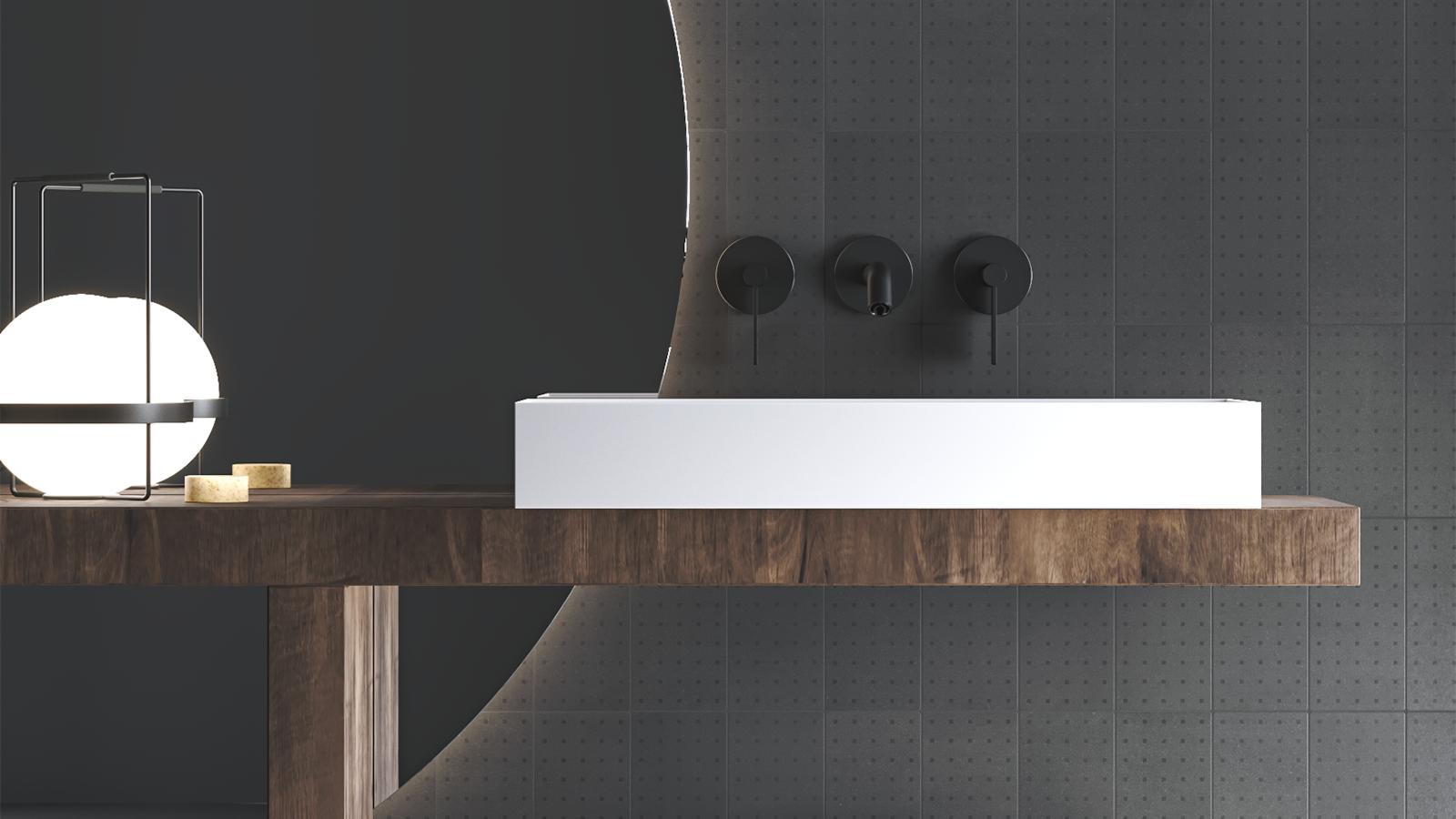 Baño realizado con azulejos hidráulicos de cemento en tonos oscuros